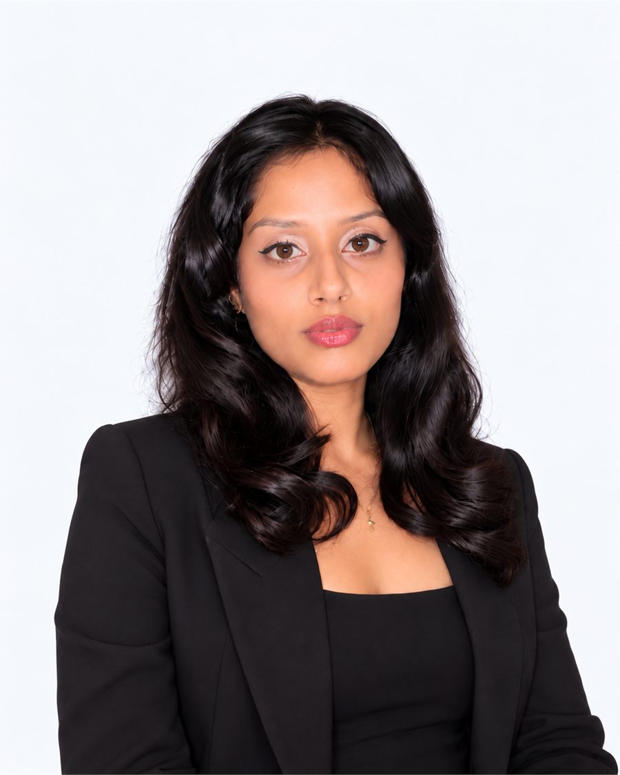Portrait of Aleena Johnson in a black blazer